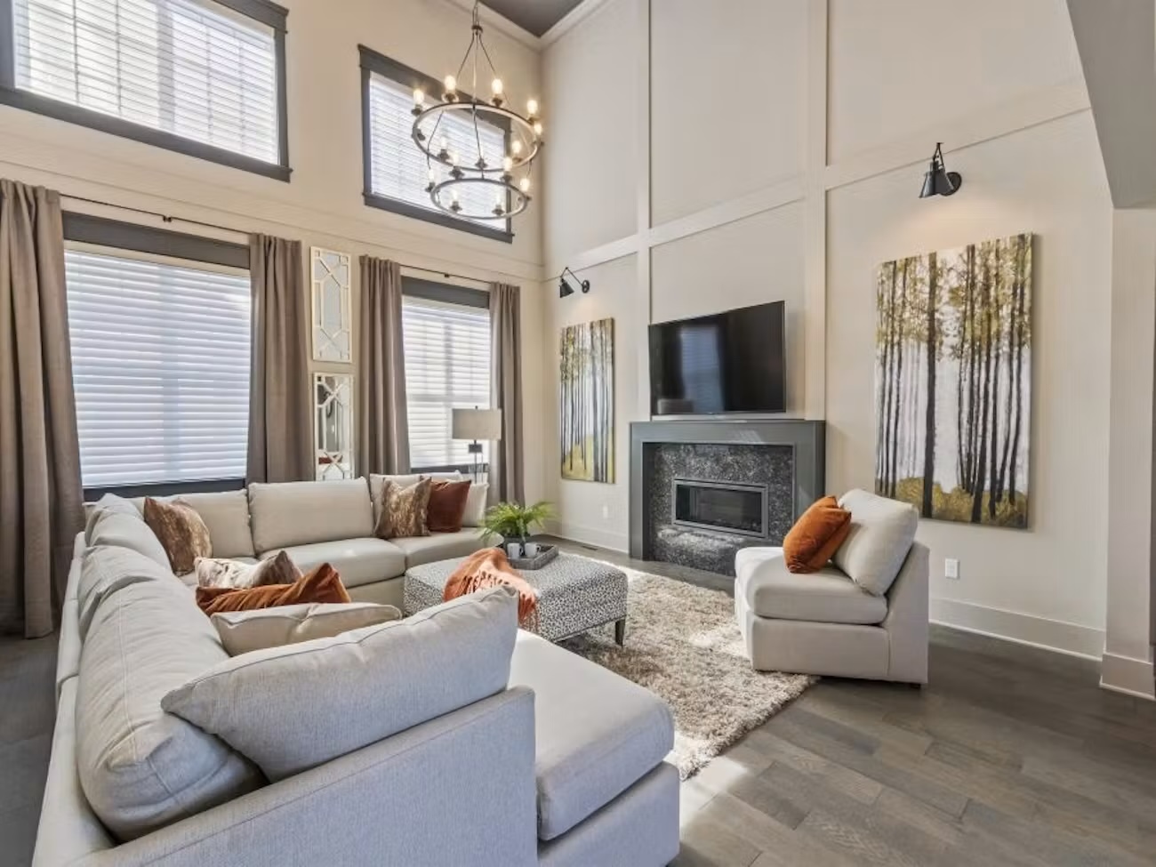 Living room layout with couches and a fireplace.